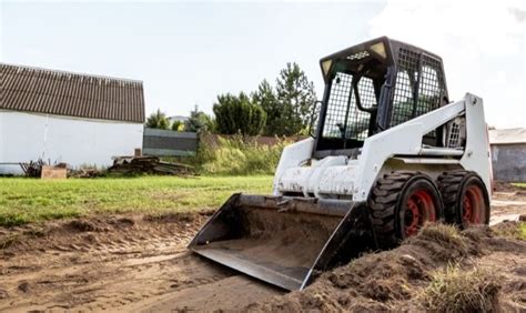 swale trench cleanup with skid steer|3 Tips for Trenching a Straight Line With a Skid Steer.